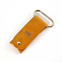 Metal twin-blade corkscrew in its orange vegetable-tanned leather case