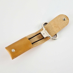 Metal twin-blade corkscrew in its orange vegetable-tanned leather case