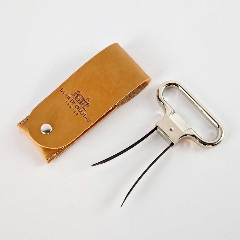 Metal two-prong corkscrew in its vegetable-tanned camel leather case