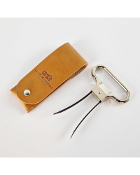 Metal twin-blade corkscrew in its orange vegetable-tanned leather case