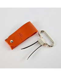 Metal two-prong corkscrew in its orange vegetable-tanned leather case