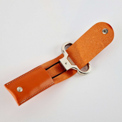 Metal two-prong corkscrew in its orange vegetable-tanned leather case