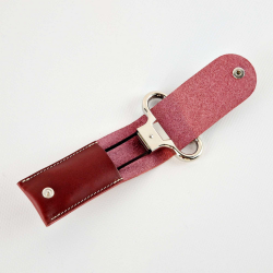 Two-pronged metal corkscrew in its Bordeaux vegetable-tanned leather case