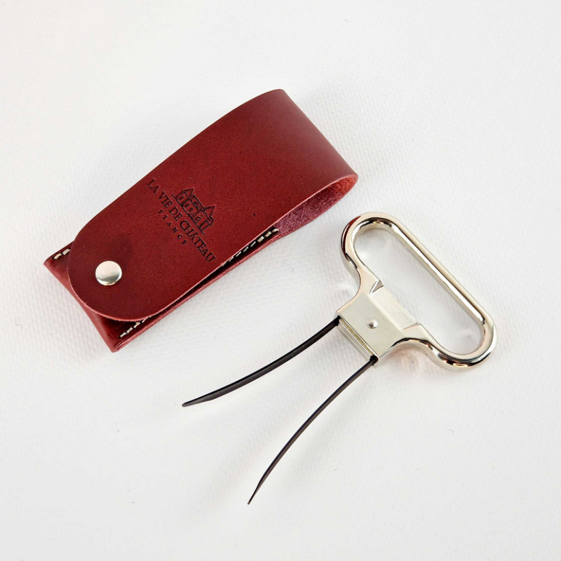 Two-pronged metal corkscrew in its Bordeaux vegetable-tanned leather case