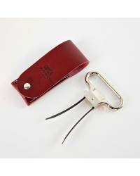 Two-pronged metal corkscrew in its Bordeaux vegetable-tanned leather case