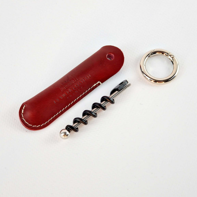 Emergency corkscrew "Jan" in its Bordeaux vegetable-tanned leather case