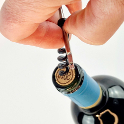 Emergency corkscrew "Jan" in its Bordeaux vegetable-tanned leather case